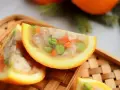Galaretka drobiowa przepis siostry Anastazji w pomarańczowych łódeczkach. Smaczna i efektowna przystawka.